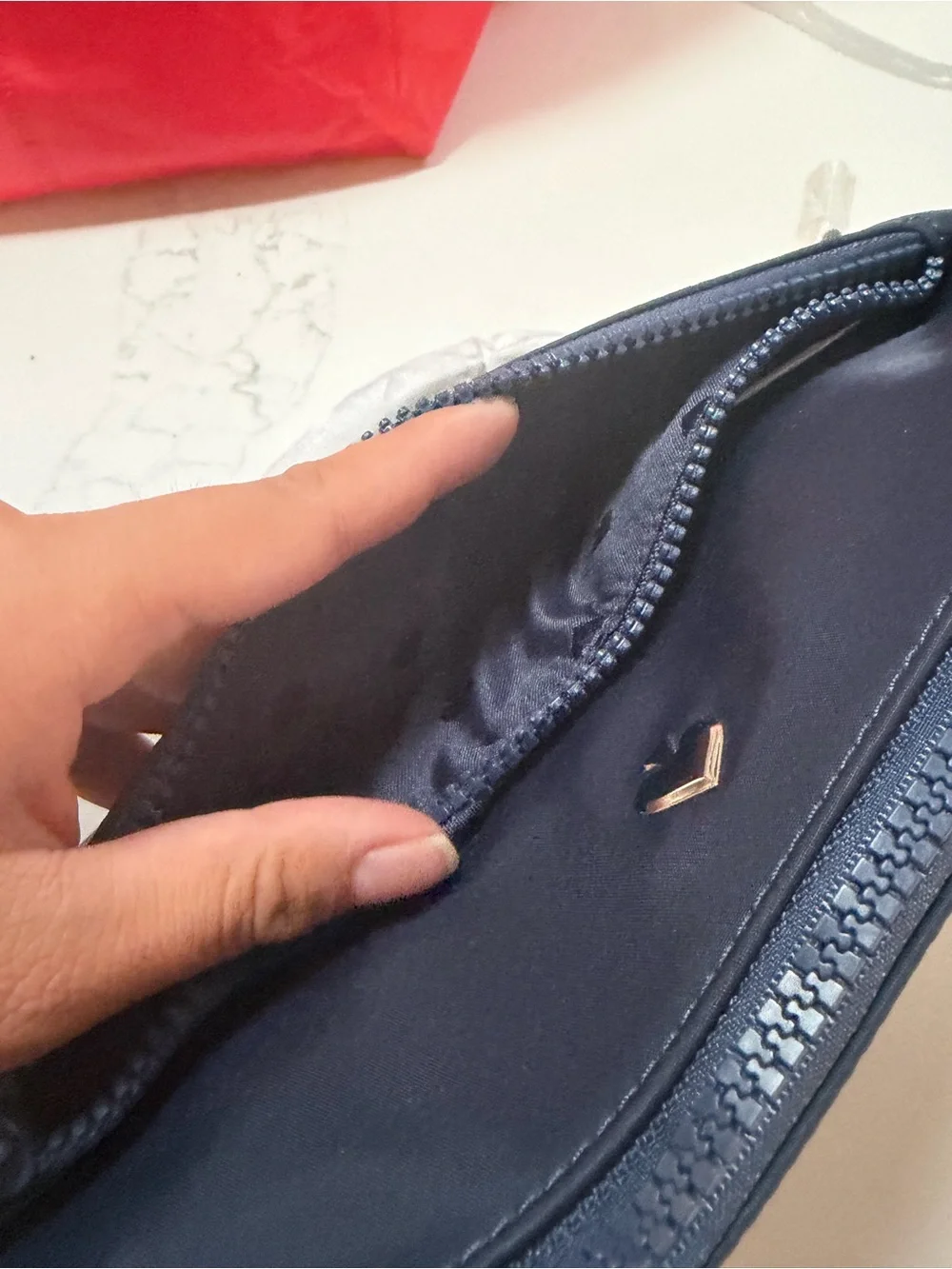 kate spade navy blue nylon crossbody with gold logo